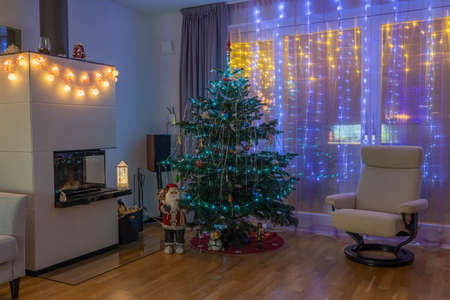 Beautiful night view of room with Christmas decoration. Christmas backgrounds. Sweden.の写真素材