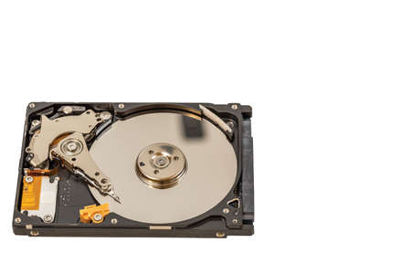 Close up view of disassembled hard drive isolated on white background.の写真素材