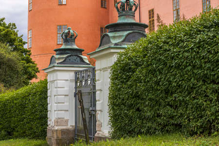 Beautiful exterior view of old entrance gate of the Renaissance castle-residence in Uppsala.の写真素材