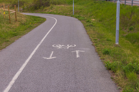 View of dedicated transport markings on sidewalk for movement of cyclists. Sweden.