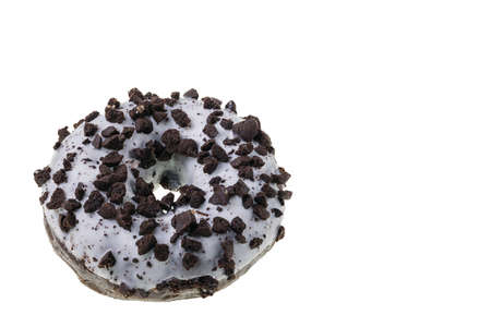 Close up view of donut sprinkled with chocolate chips isolated on white background. food and drink concept. Sweden.の写真素材
