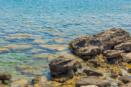 Close up view of rocks on coastline. beautiful nature backgrounds. Greece.の写真素材