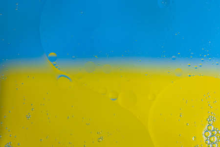 Close up view of beautiful water with Ukraine flag abstract design textureの写真素材