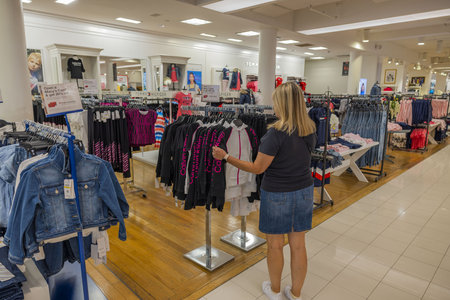 Interior view of female customer in children clothes department of Macy's store. new. York. USA...