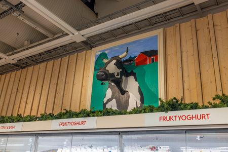 Close up view of dairy department symbol with view of cow's head in supermarket. Sweden. uppsala. 12.14.2022.のeditorial素材