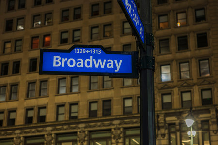 Beautiful view of city at night and Broadway sign at intersection of West 34th street. new york....