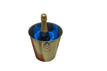 Close up view of bottle of champagne in special bucket isolated on white background.の写真素材