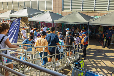Close up view of organized tourist line to boat trip. New York, USA. 09.21.2022.のeditorial素材