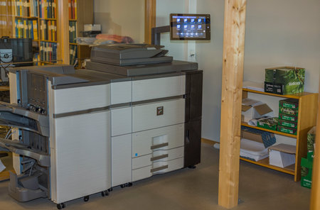 View of interior office building with SHARP color laser multifunction printer. Sweden. uppsala. 01.22.2023.のeditorial素材