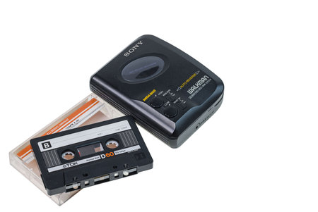 Close-up view of Sony Walkman audio player with TDK audio cassette isolated on white background. Sweden. uppsala. 05/02/2023.のeditorial素材