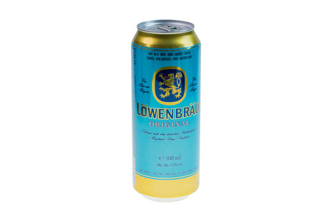 Close up view of can of Germany beer Lowenbrau isolated on white background. Sweden. uppsala. 02.11.2023.のeditorial素材