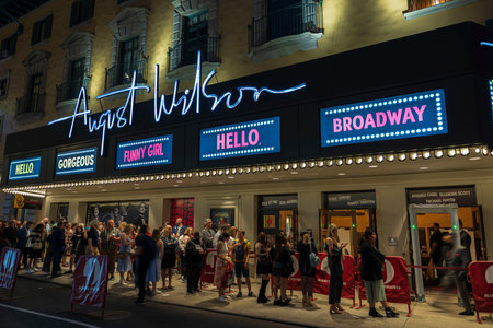 View of people in line to watch famous musical at August Wilson theater on Broadway, Manhattan, New...