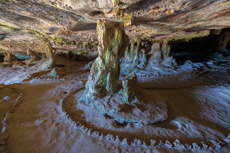 Close up view of mountain cave with beautiful stalactites. Aruba island.の写真素材