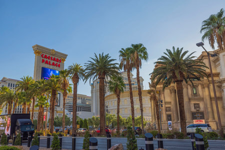 Beautiful view through Strip and palm trees on Caesars Palace casino in Las Vegas, USA. Las Vegas. 09.18.2022.のeditorial素材