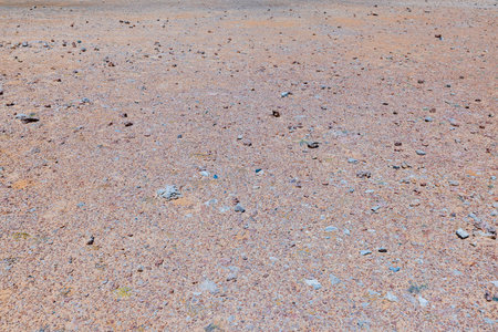 Close-up view of texture of stone ground in desert of Aruba island.の写真素材