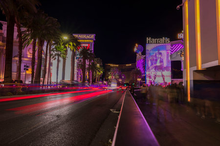 Beautiful view of out-of-focus strip road tracers. Night view of Las Vegas cityscape with defocused light tracers of cars on Strip Road. Las Vegas. USA. 09.17.2022.のeditorial素材