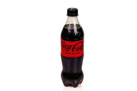Close up view of cold plastic sugar-free bottle with Coca Cola isolated on white background. Sweden Uppsala. 04.10.2023.のeditorial素材