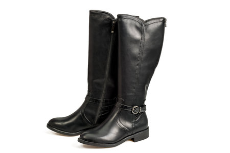 Close-up of black women's leather knee-high boots isolation on white background. Sweden.の写真素材