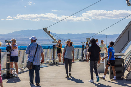 View of tourists on open main observation desk of hotel Strat of downtown Las Vegas. Las Vegas, Nevada, USA. 09.18.2022.のeditorial素材