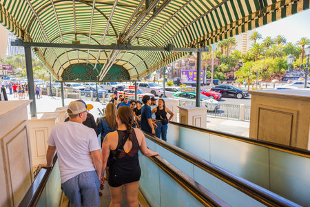View of tourists on escalator stairs. Las Vegas Strip, USA. 09.17.2022.のeditorial素材