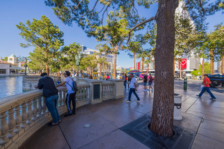 Beautiful landscape view of Strip Road with tourists walking near Bellagio casino hotel on sunny summer day. Las Vegas, Nevada, USA. 09.17.2022.のeditorial素材