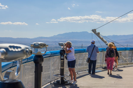 View of tourists on open main observation desk of hotel Strat of downtown Las Vegas. Las Vegas, Nevada, USA. 09.18.2022.のeditorial素材