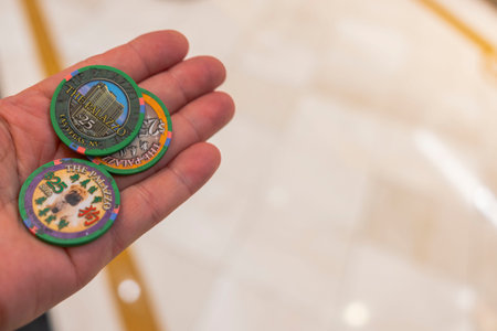Close up view of casino chips on man's hand. Las Vegas. USA.のeditorial素材
