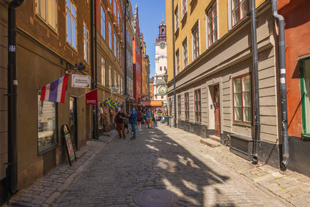 People on narrow cobbled streets of Stockholm's old town area. Sweden. Stockholm.のeditorial素材