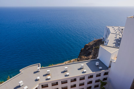 Beautiful aerial view of hotel and vast expanse of Atlantic Ocean of island of Gran Canaria. Spain.の写真素材