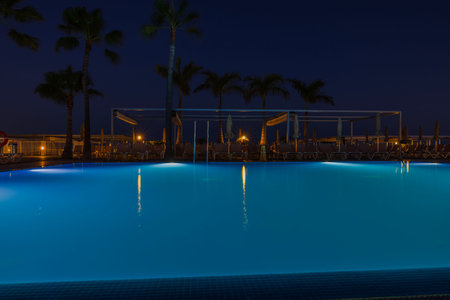 Beautiful night view of hotel with outdoor pool on night sky background. Spain. Gran Canaria.の写真素材