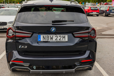 Beautiful back view of 2023 BMW iX3 M Sport - Electric SUV black car.のeditorial素材