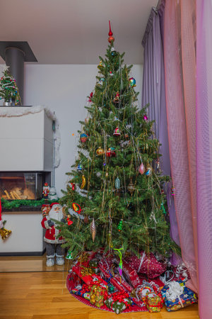 Beautiful interior view of room with decorated Christmas tree.の写真素材