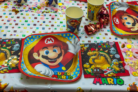 Beautiful view of served table with Mario theme decoration prepared for partyのeditorial素材