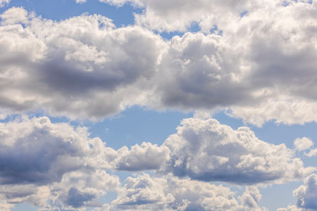 Beautiful view of puffy clouds on blue sky background. Beautiful background textures concept.の写真素材