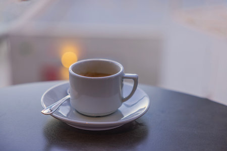Close-up view of cup of coffee on table in restaurant.の写真素材