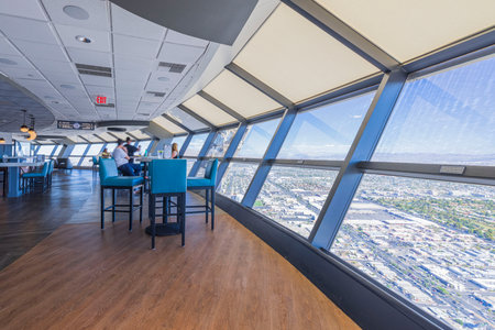 View of cafe on one of floor at Strat Hotel , Casino and Tower, with panoramic windows, captivating Las Vegas skyline view. Las Vegas.のeditorial素材
