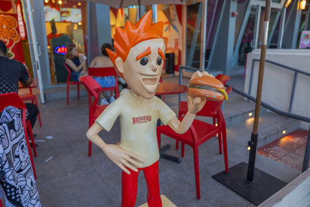 Close-up view of funny RedHead Burger figure adorning restaurant terrace in Miami Beach, Florida, USA.のeditorial素材