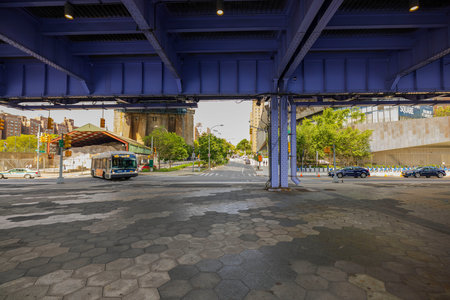 Scenic view of moderate traffic flowing beneath Brooklyn Bridge. Manhattan, New York, USA.のeditorial素材