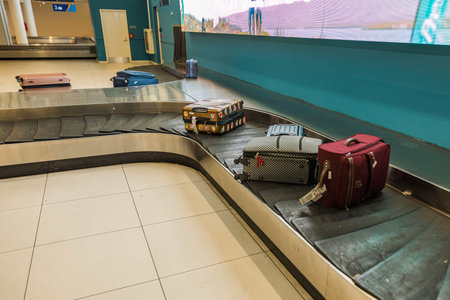 View of baggage carousel in Willemstad Airport, at luggage pick-up area following arrival. Curacao. Willemstad.のeditorial素材