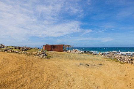 Abandoned wooden fisherman's hut on the shores of the Caribbean Sea in Aruba.の写真素材