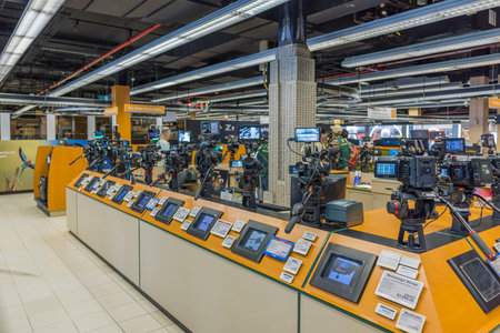 Close-up view of the interior of BH store with shelves showcasing cameras from various brands. New...