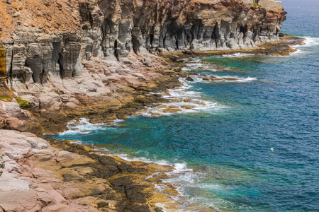 Breathtaking view of rocky coastline of Atlantic Ocean on island of Gran Canaria.の写真素材