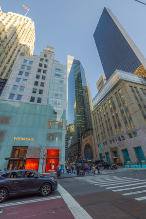 Beautiful view of Fifth Avenue with the Louis Vuitton boutique and people crossing the street at the...