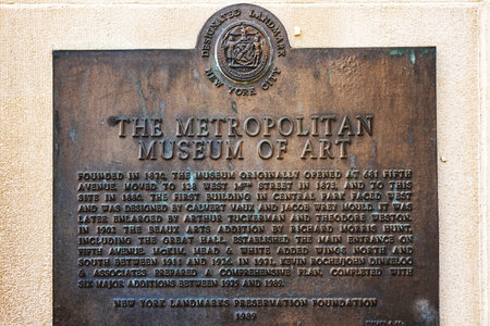 Bronze plaque designing the Metropolitan Museum of Art as New York City landmark, featuring historical information. New York. USA.のeditorial素材