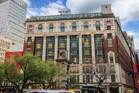 Iconic Macy's building facade at Herald Square in New York City, featuring historic architecture and American flags. New York. USA.のeditorial素材