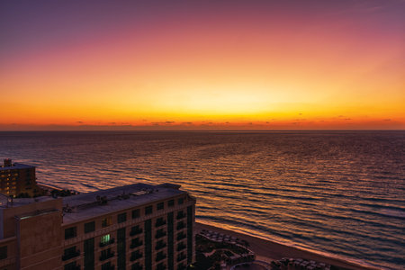 Caribbean Sea at dawn with colorful sky and hotel rooftop view from high floor at early morning. Mexico. Cancun.の写真素材