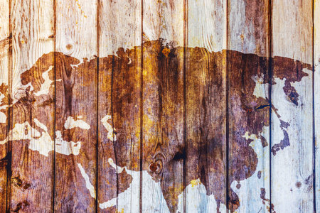 World map of Europe and Asia painted on old wooden planks with vintage rustic texture. Sweden.の写真素材