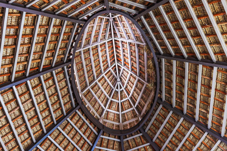 Close up view of thatched wooden roof structure inside tropical hotel resort building. Punta Cana. Dominican Republic.の写真素材