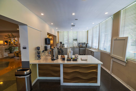 Close up view of hotel cafe self service coffee station with equipment and counter. Miami Beach....