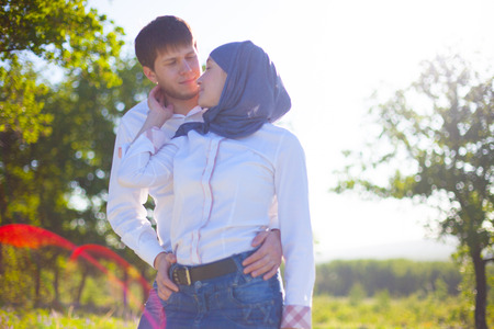 Outdoors portrait of a happy young coupleの写真素材